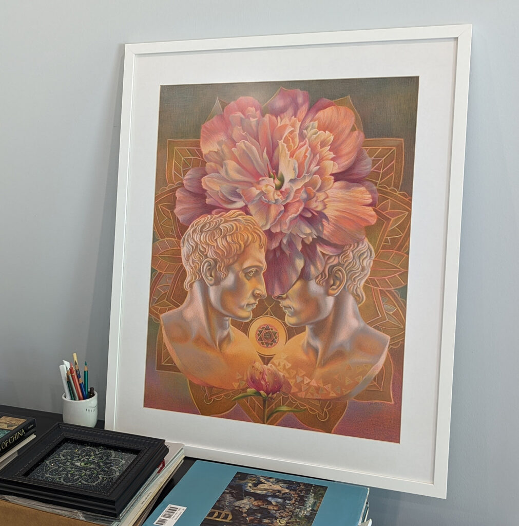 Framed flower and person artwork