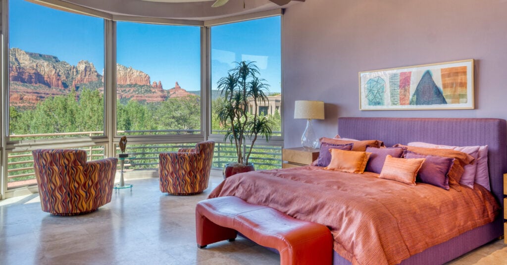 Purple bedroom with a view southwestern style