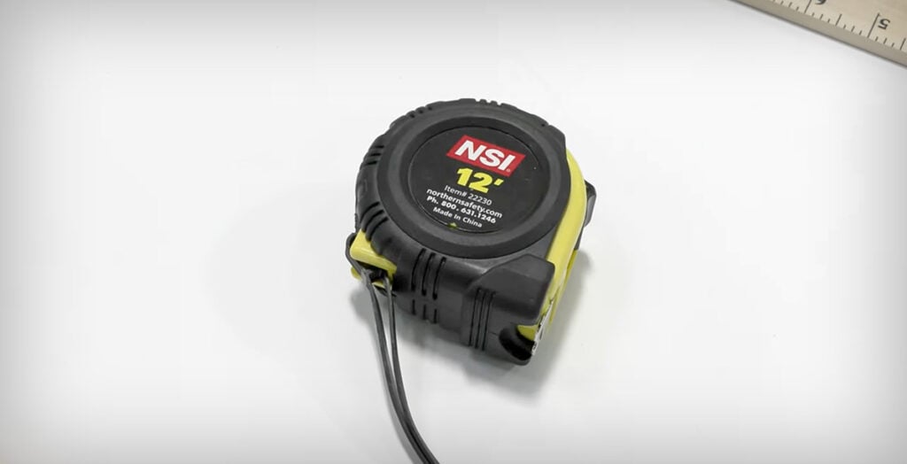 Picture of retractable tape measure.